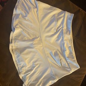 Adidas baby blue golf skirt.  New without tags.  Super cute ruffle skirt.